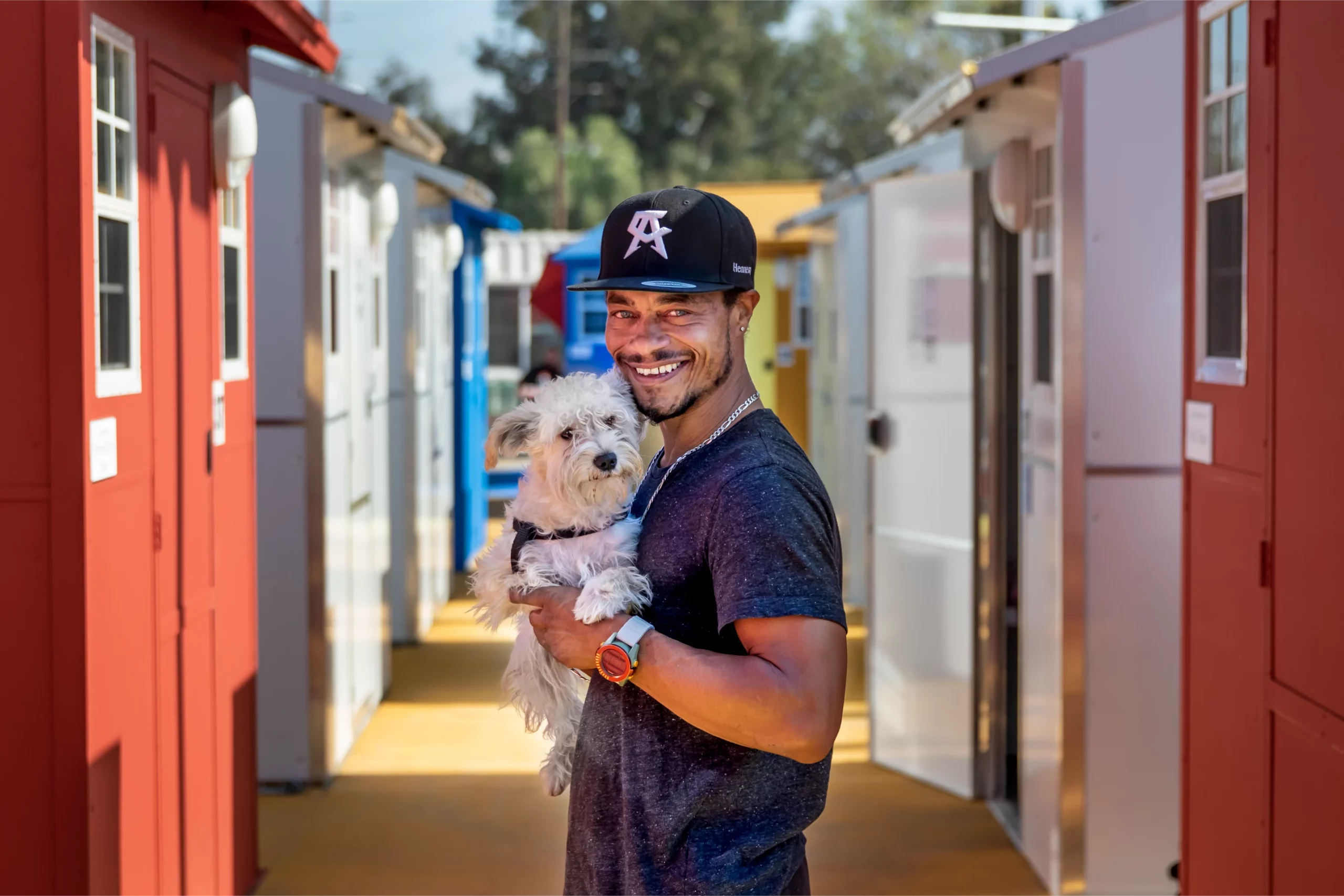 Resident Outside Tiny Home